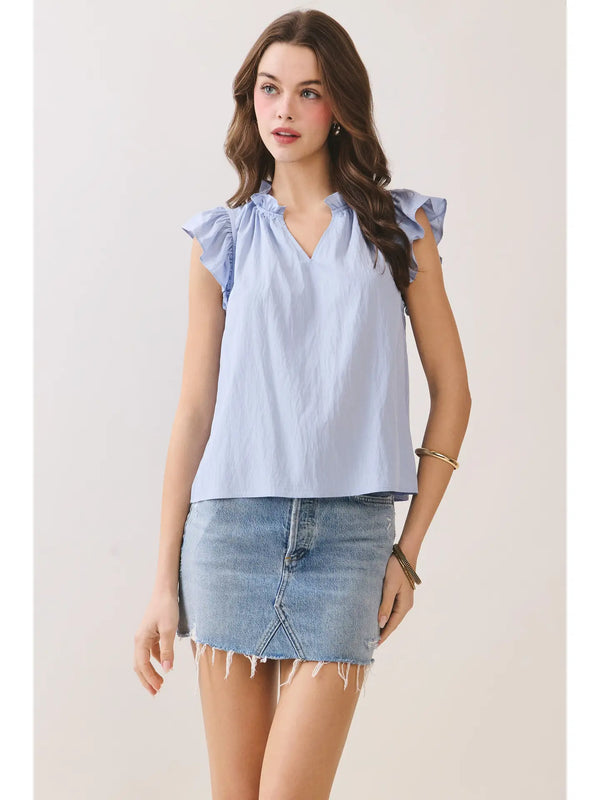 Soft Blue Ruffled Mock Neck Top with V-Notch Detail