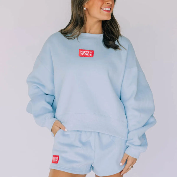The Becca Boxy Crewneck Hotty Toddy Woven Label | Light Blue
