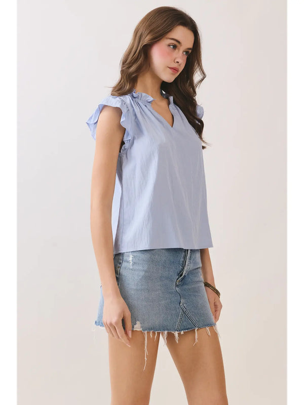 Soft Blue Ruffled Mock Neck Top with V-Notch Detail